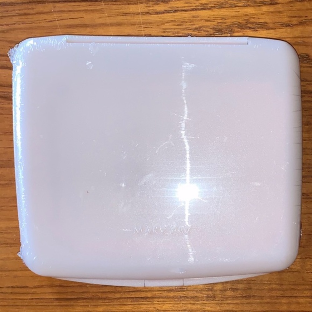Mary Kay NWOT pink compact travel mirror. In original wrapping.